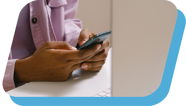 Man sitting with laptop and smartphone